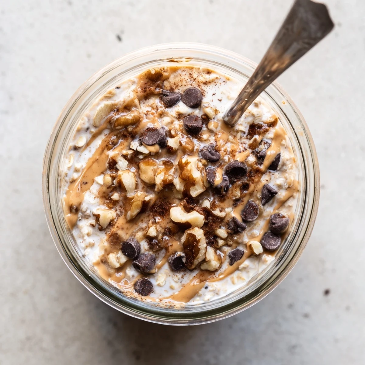 Stirred together with almond butter and maple syrup, this easy breakfast is topped with extra mini chocolate chips.