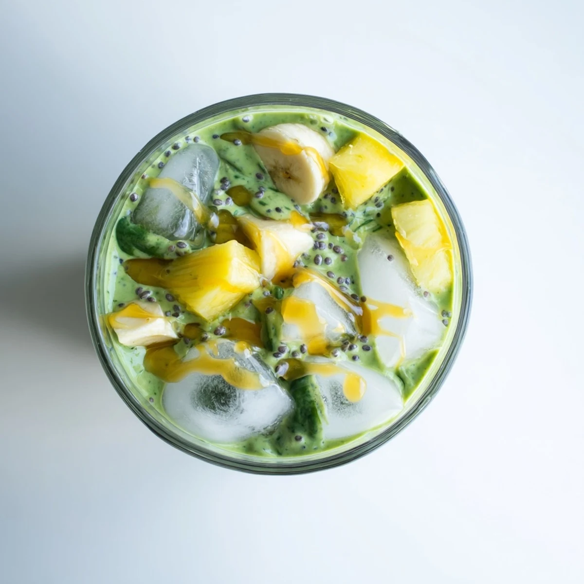 Homemade Greek yogurt green smoothie featuring vibrant green spinach and creamy yogurt texture
