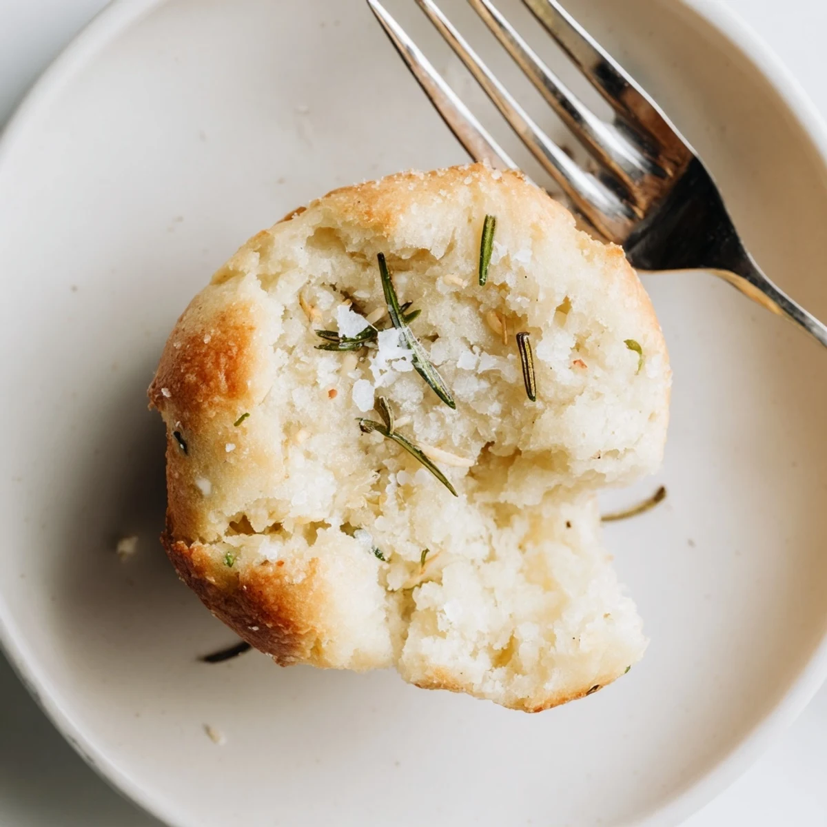 Warm Garlic Rosemary Focaccia Muffins served with olive oil and balsamic for dipping.