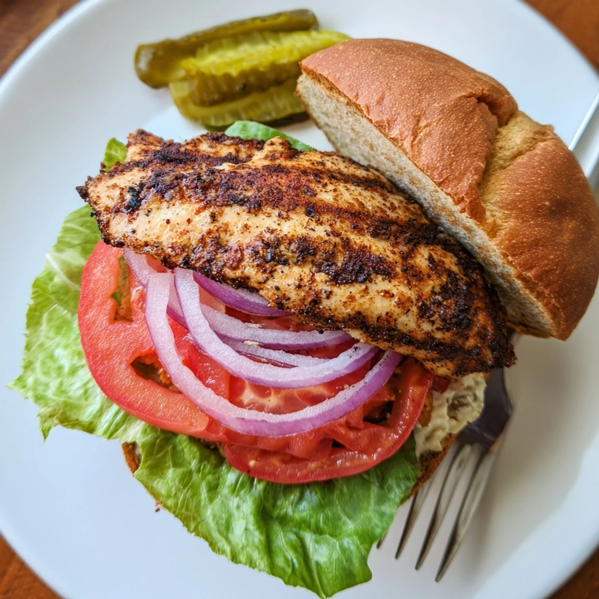 Plate of complete Savory Spiced Chicken Sandwich meals featuring grilled chicken breasts toasted buns and tangy mustard sauce topping