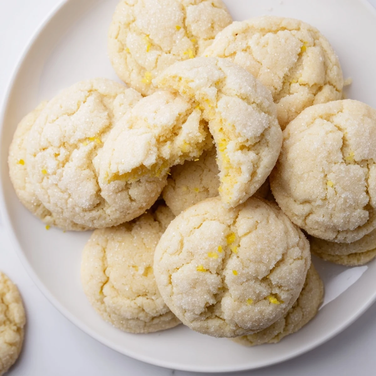 Soft Chewy Lemon Cookies cooling on a wire rack, sugared, bright citrus aroma
